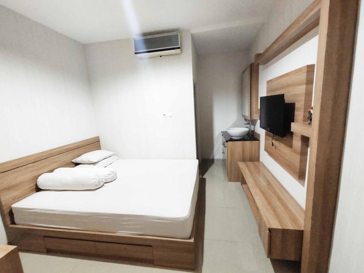 37 Guesthouse Jakarta Szoba fotó