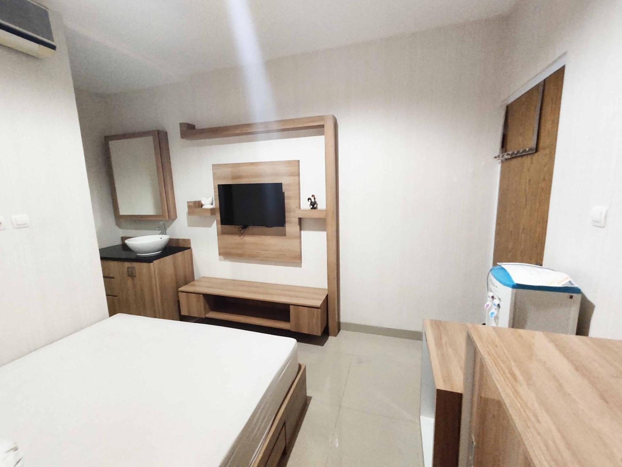 37 Guesthouse Jakarta Szoba fotó